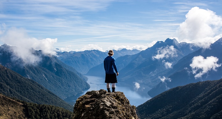 Hiker on the Kepler Track in Fiordland National Park, New Zealand