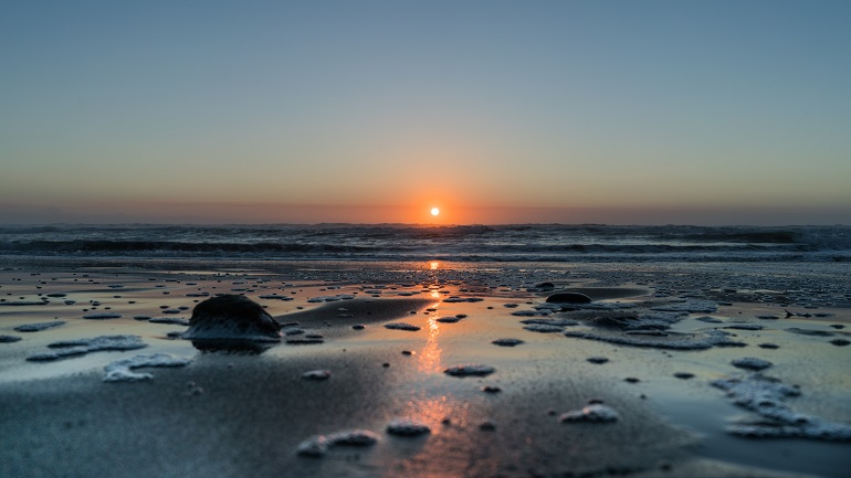 Taranaki sunset over the ocean in New Plymouth, New Zealand