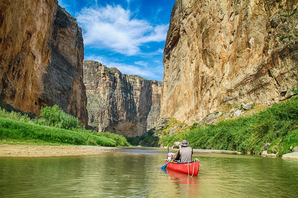 Paddling a canoe on the Rio Grande in Big Bend National Park, Texas