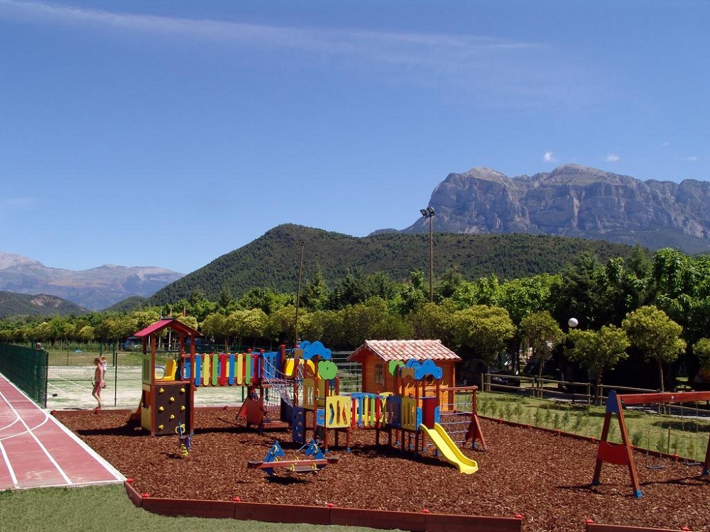 Playground & tennis courts at Camping Peña Montañesa, Spain