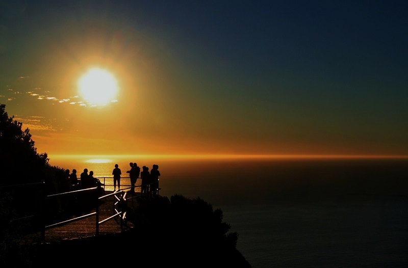 Viagem a Chapmans Peak ao pôr-do-sol, África do Sul